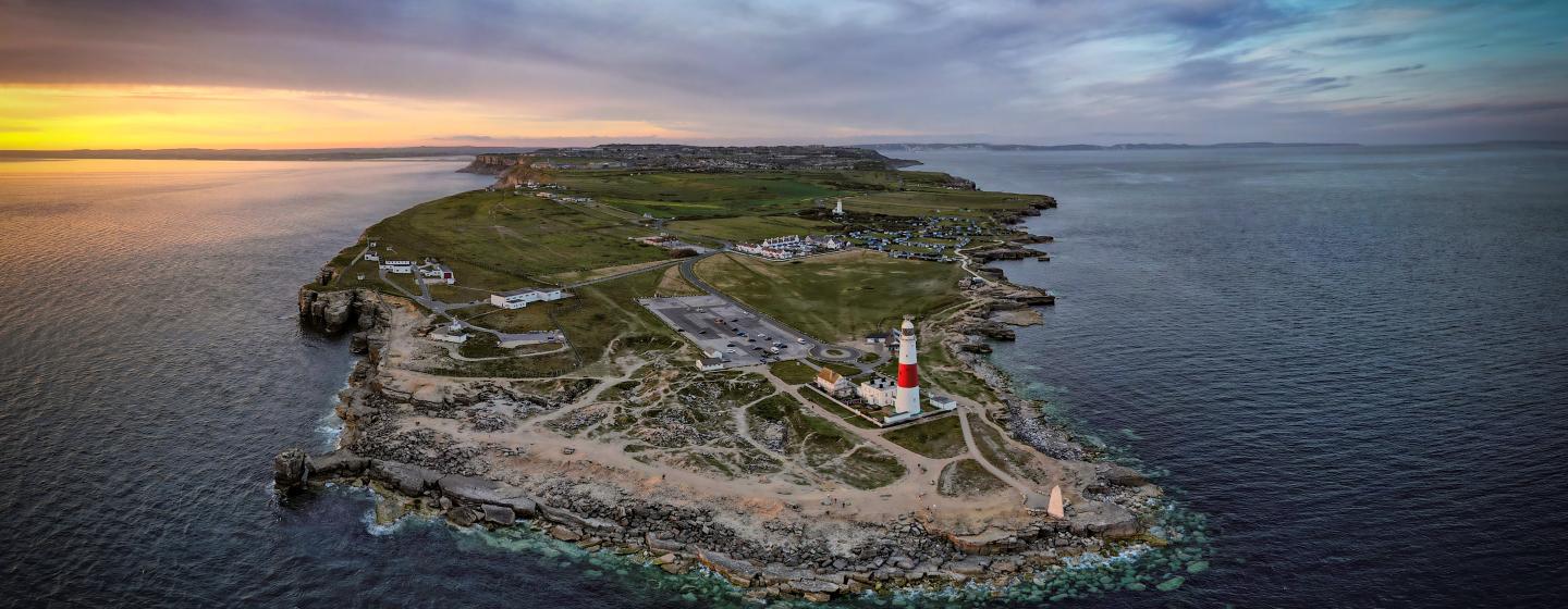 A colour photo of the isle of Portland taken from the air