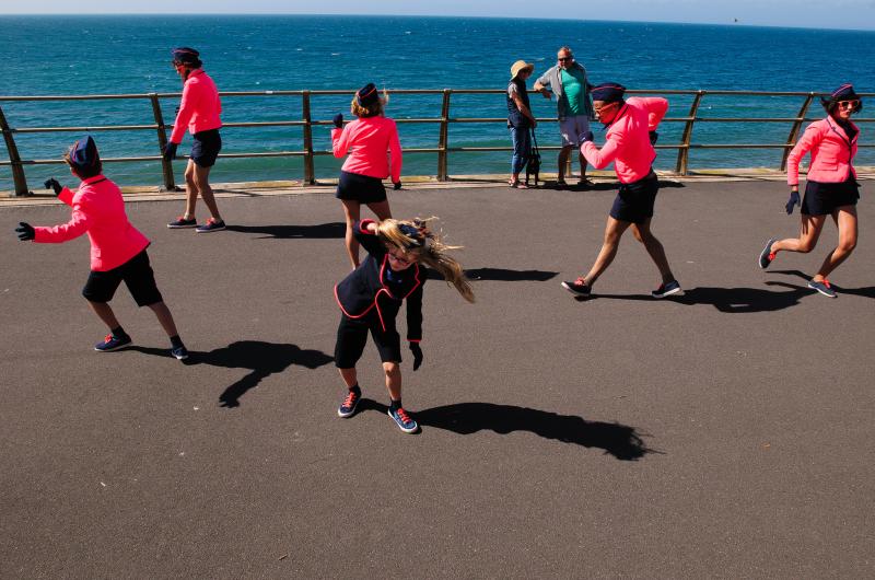 Performers at sea front